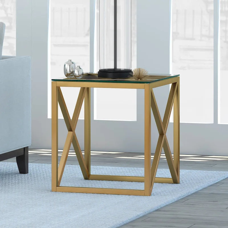 Table d'appoint géométrique en métal et verre avec piètement en X, finition laiton doré
